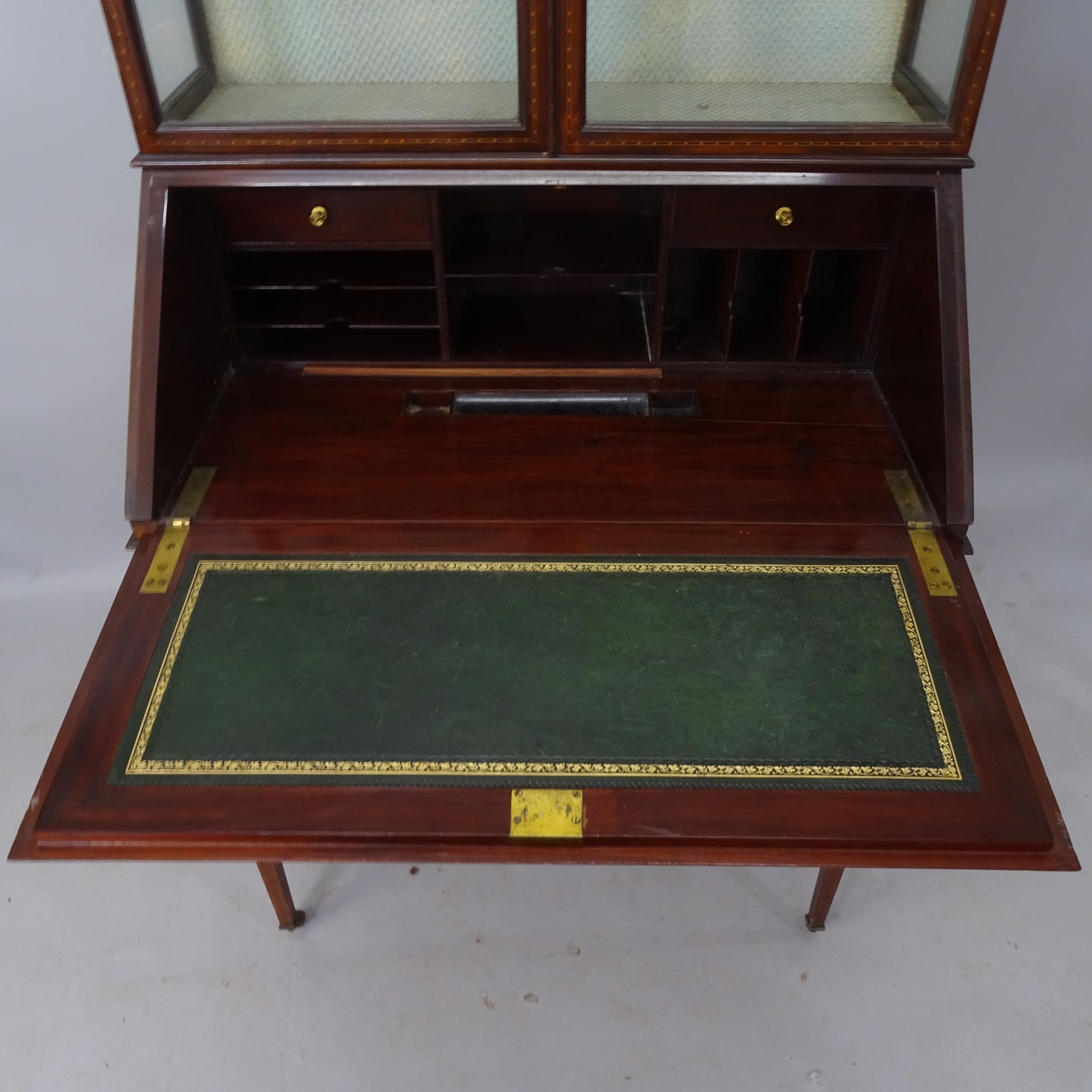 An Edwardian mahogany and satinwood-strung 2-section bureau bookcase, the fall-front revealing a - Image 2 of 2