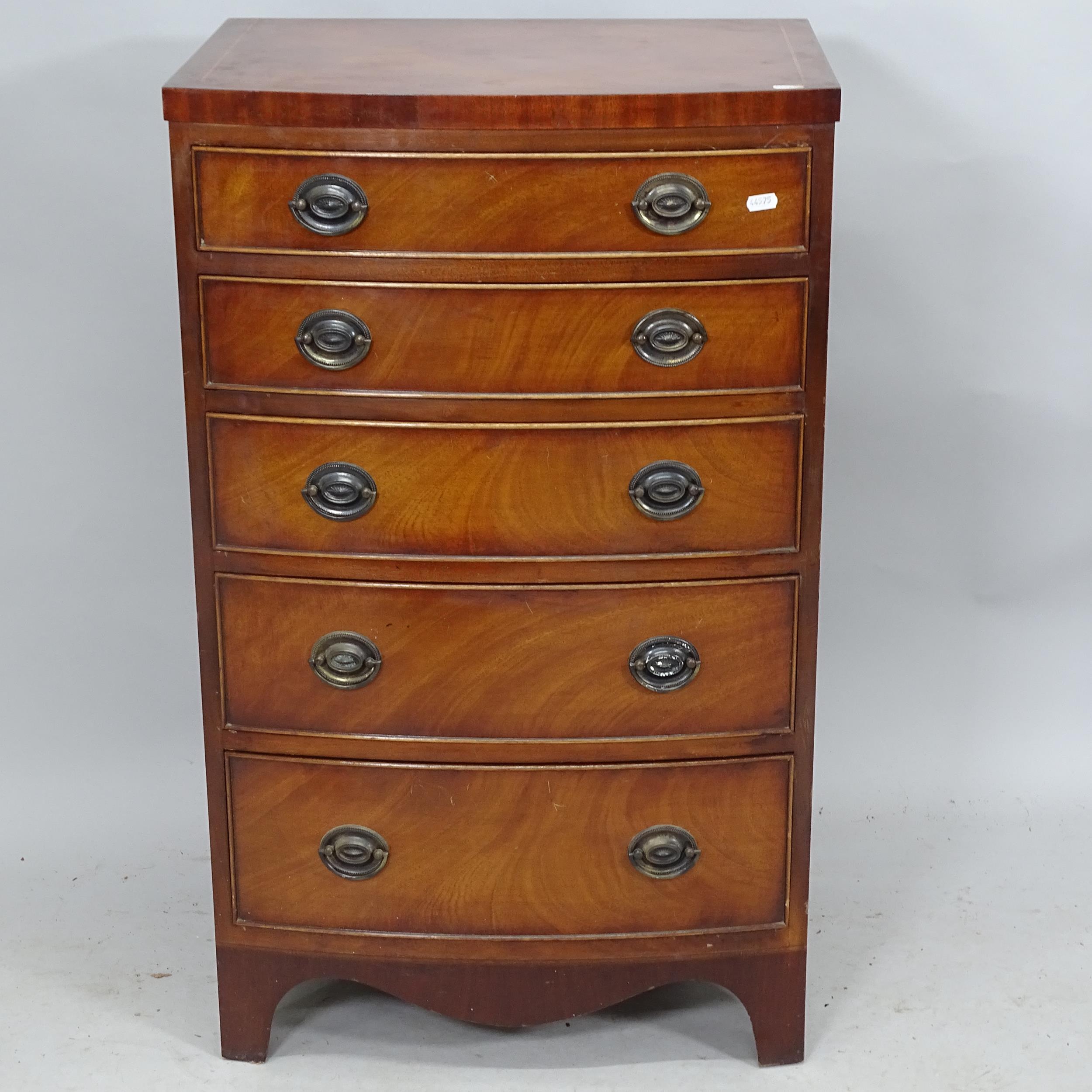 A reproduction mahogany and satinwood strung bowfront chest of five drawers. 56cm x 92cm x 43cm