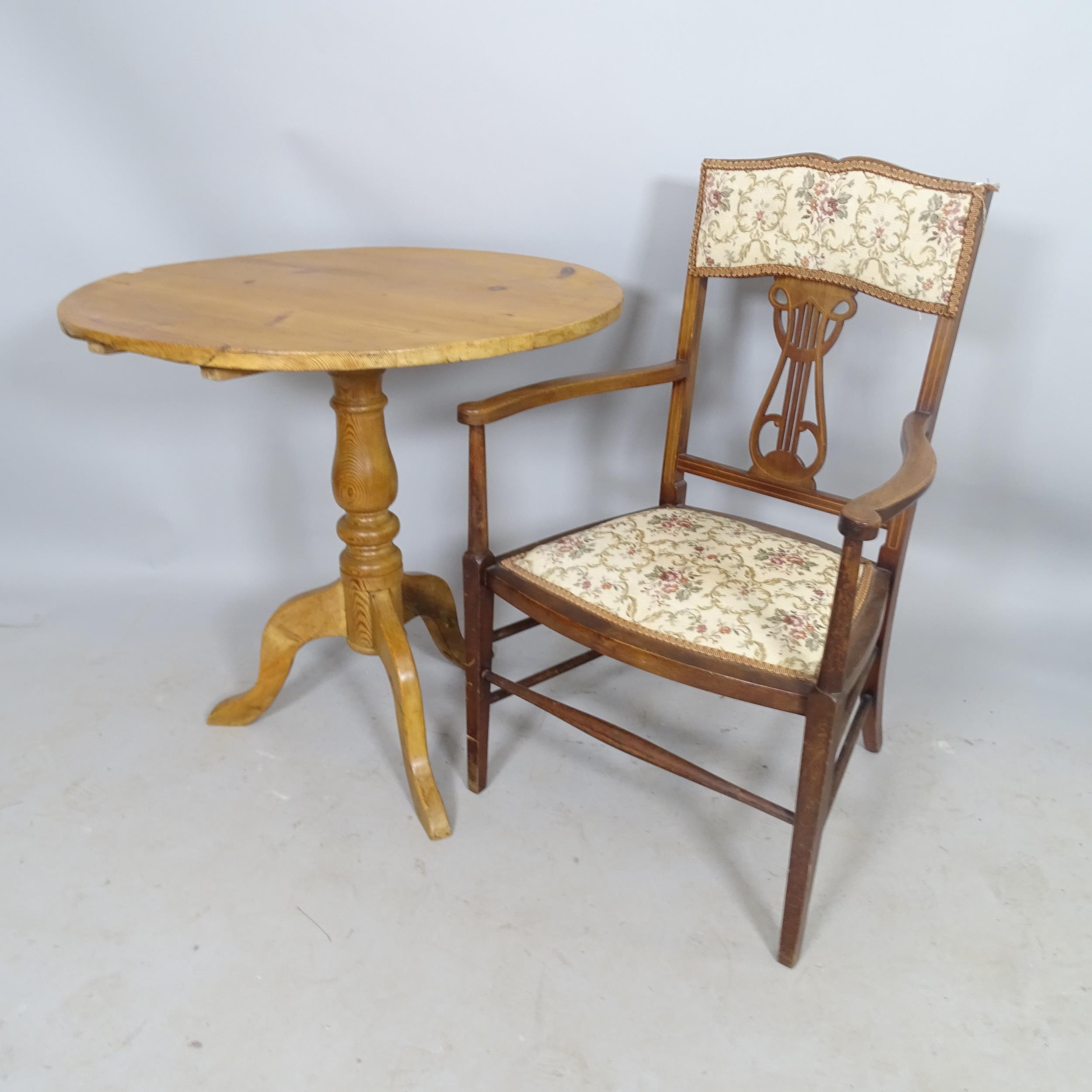 A modern pine circular-top occasional table, 69 x 68cm, and an Edwardian mahogany and satinwood-