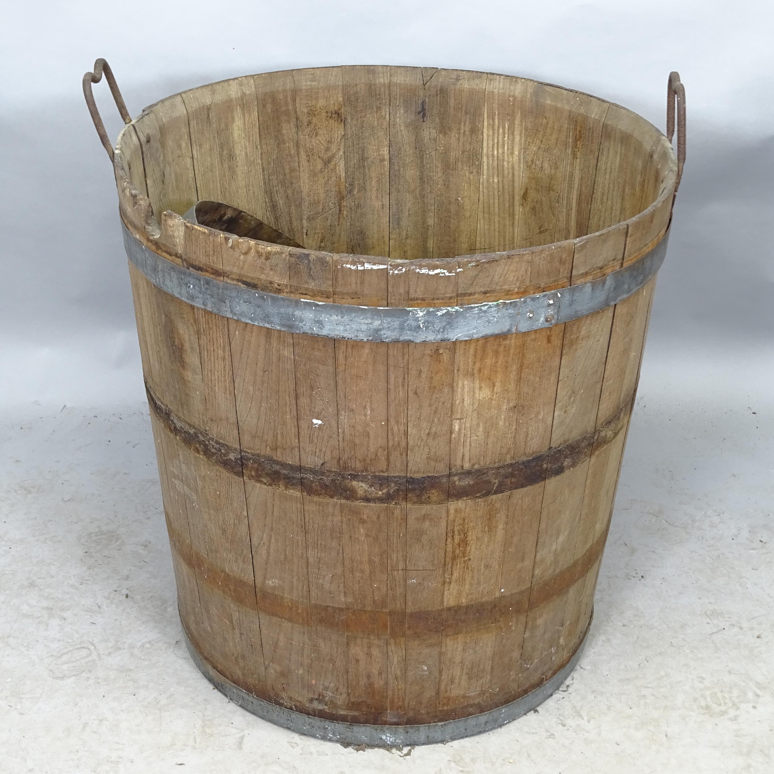 A large coopered oak 2-handled grape barrell, W75cm, H74cm