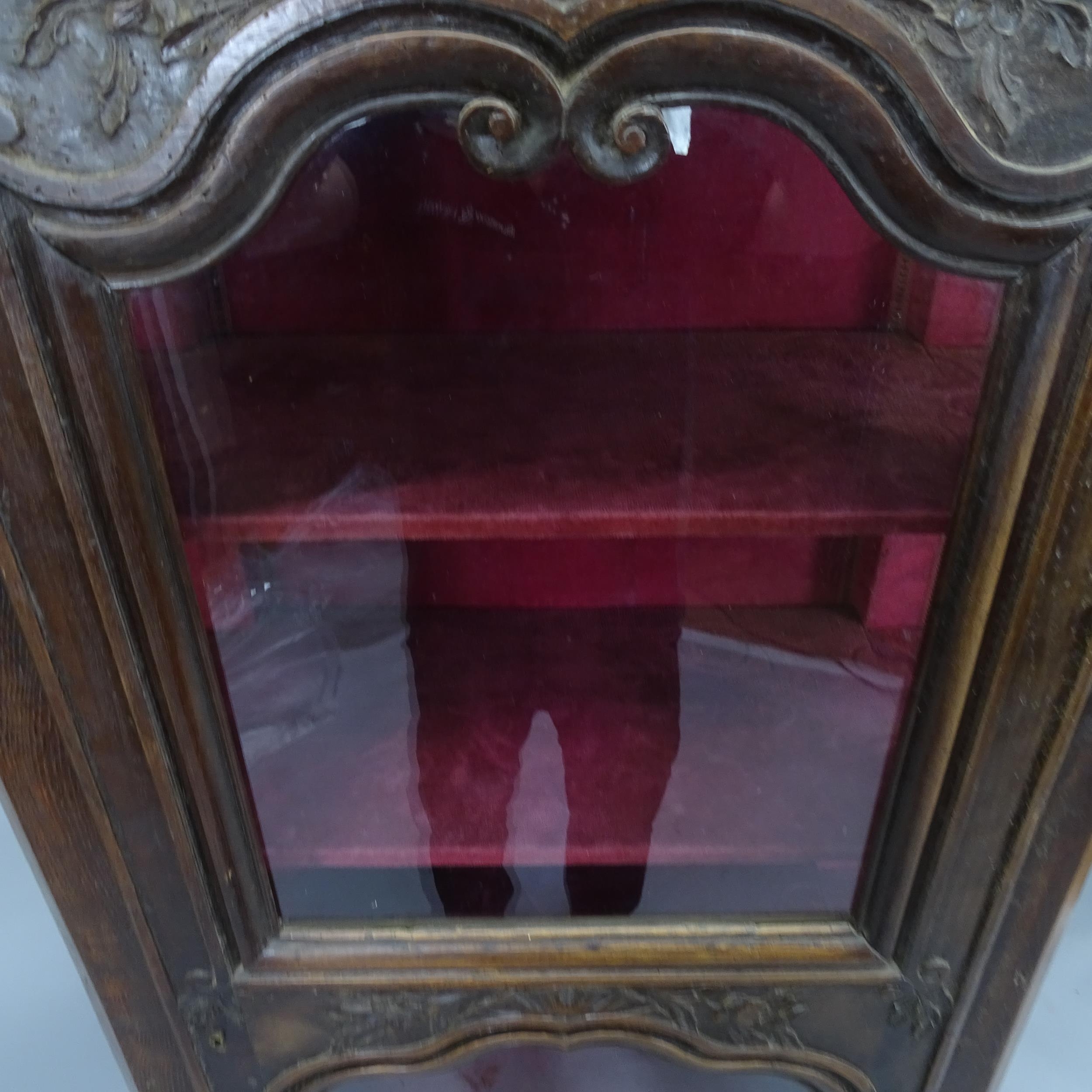 A French oak single door display cabinet, with glazed panelled sides and carved decoration, 80 x 200 - Image 2 of 2