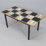 A mid-century tiled coffee table, tiles depicting 16th century playing cards each with artist's