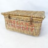 A wicker laundry basket with leather bindings, lettering to frontage - Pineland laundry. 78 x 38 x