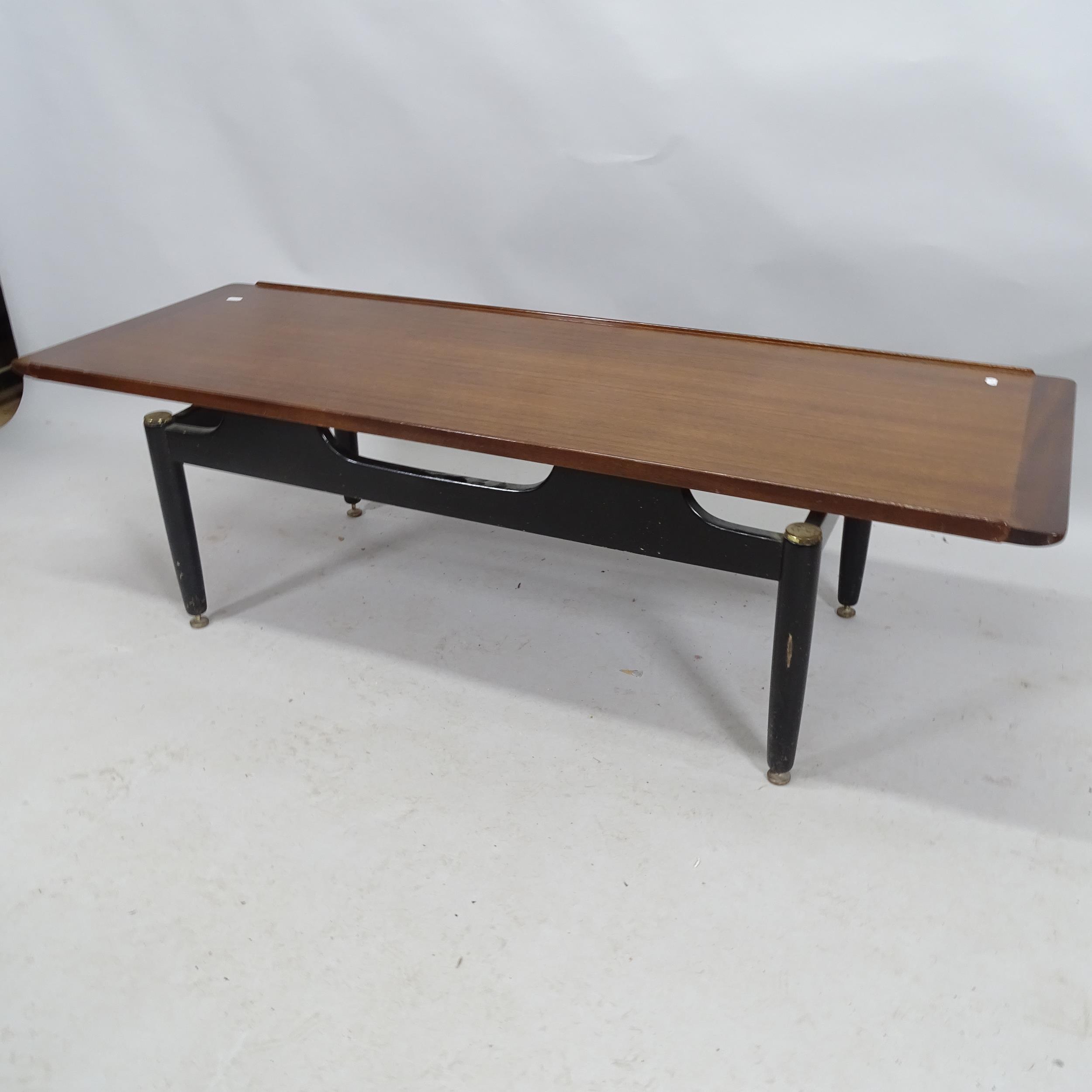 A mid-century teak G-Plan Librenza coffee table with maker's label. 138cm x 40cm x 49cm