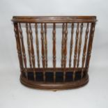 An oak stick/umbrella stand with painted metal drip tray. 75cm x 66cm x 24cm