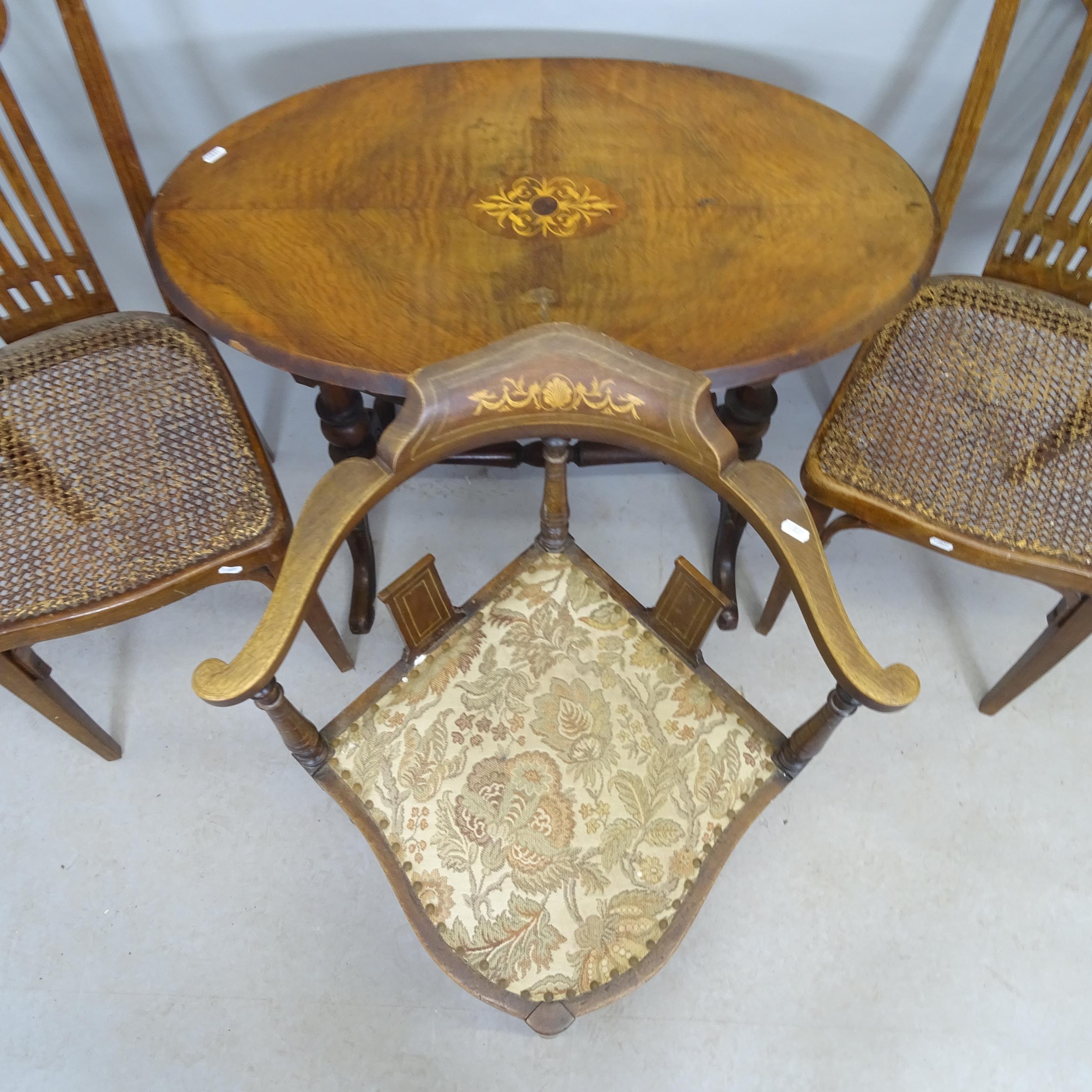 A pair of early 20th century mahogany cane seated dining chairs with bentwood stretchers, a corner - Image 2 of 2