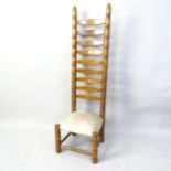 A mid-century French tall ladder-back chair, in the manner of Charles Dudouyt