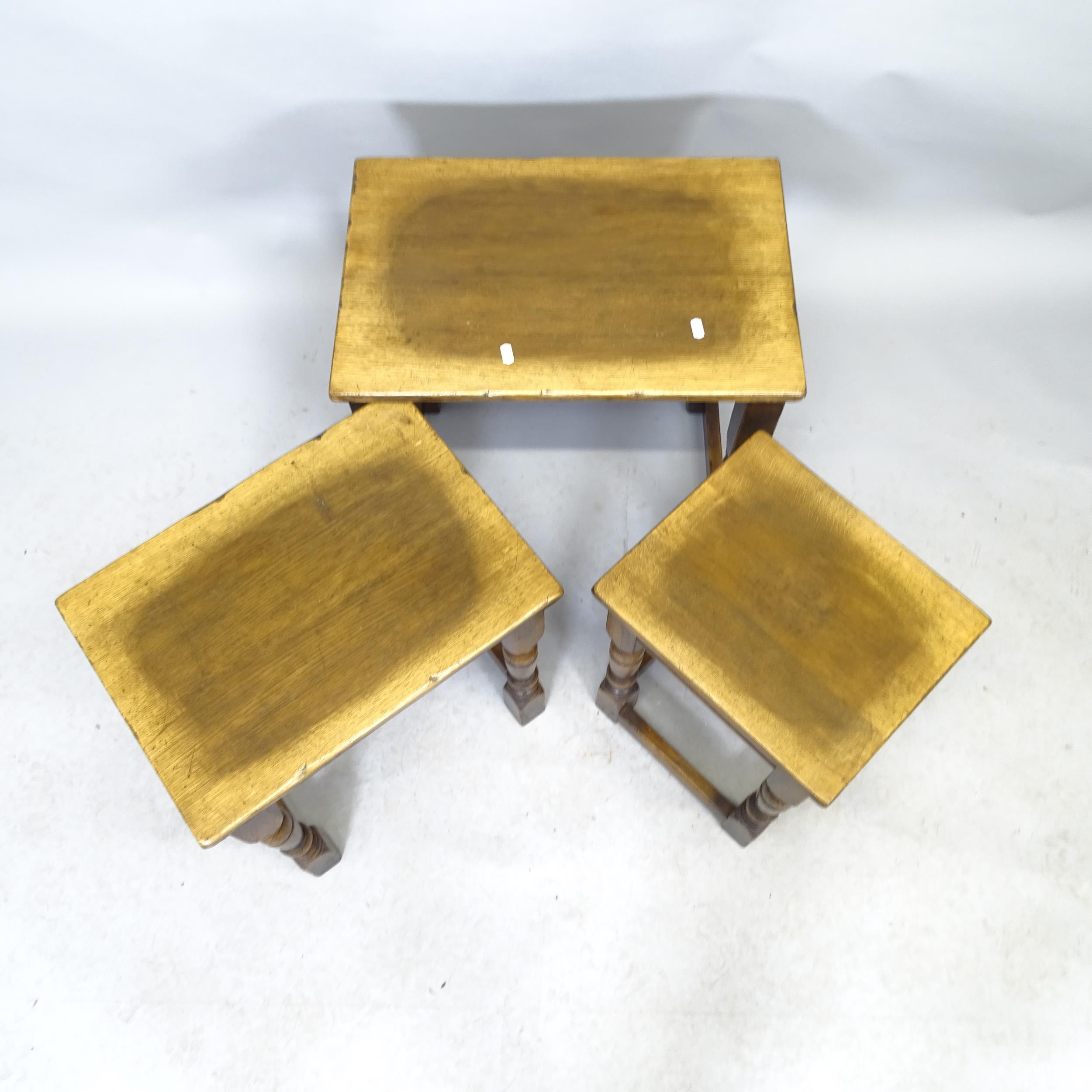 An Ipswich Oak design nest of three occasional tables. Largest 53cm x 50cm x 36cm - Image 2 of 2