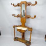 A Victorian oak tree-design hallstand, with mirror back, marble shelf and fitted drawer. 103cm x