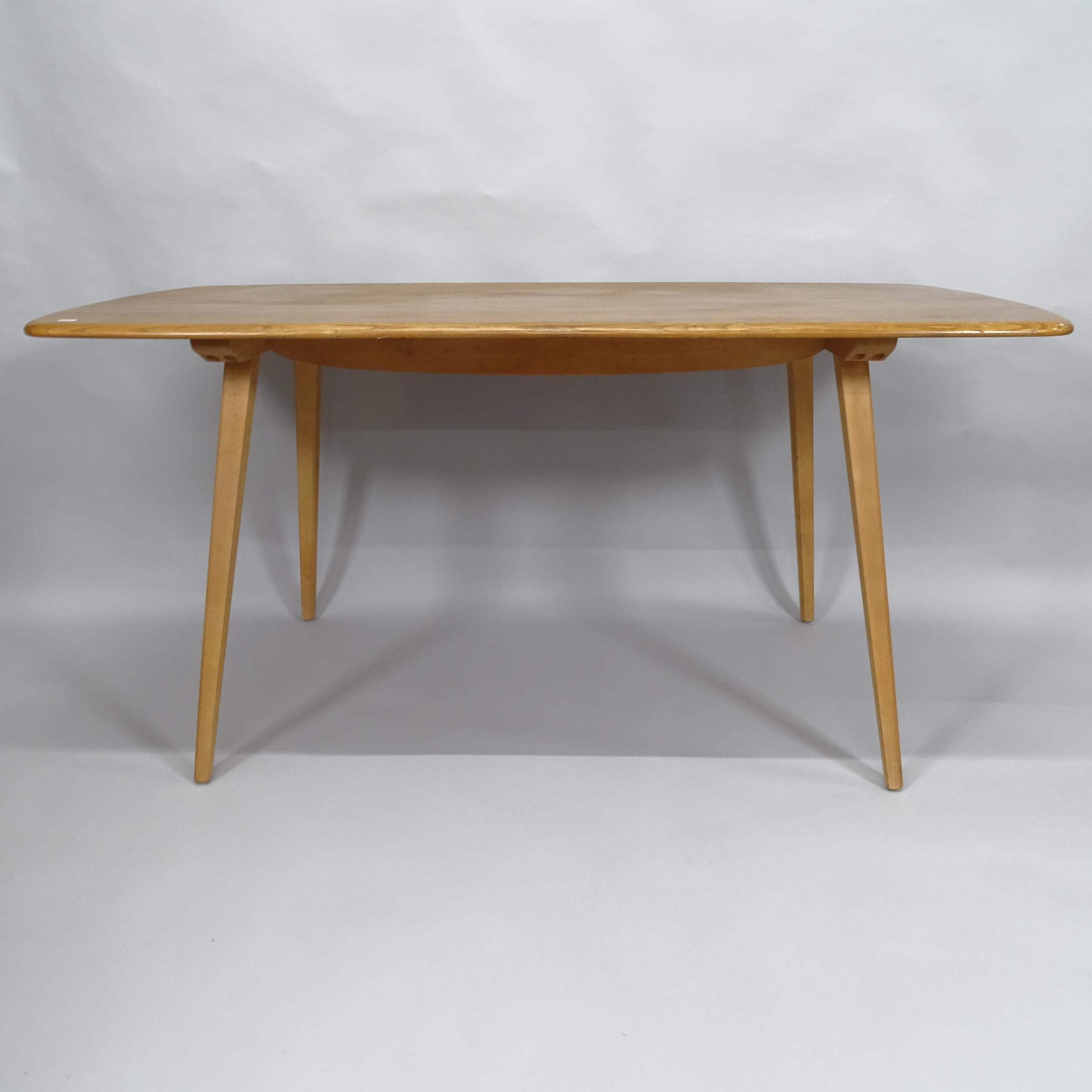 A mid-century Ercol Windsor elm plank-top dining table, circa 1960s, 152cm x 72cm x 76cm