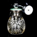 A cut-glass silver and green enamel atomiser perfume bottle with chrome plate attachment, height