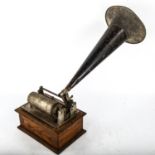 A Vintage wax cylinder player, late 19th century, in original oak case with original tin horn, no
