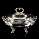 A large silver plated 2-handled soup tureen and cover, with cast foliate decoration on scrolled