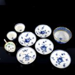 A group of 18th century blue and white dishes, tea bowls etc (9)