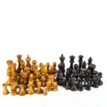 A quantity of Staunton pattern boxwood and ebony chessmen from various sets, including Jaques, in