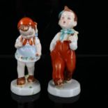A pair of Royal Dux ceramic children figures, height 16cm