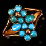 A Georgian turquoise pansy ring, unmarked gold settings with cabochon turquoise and closed backs,