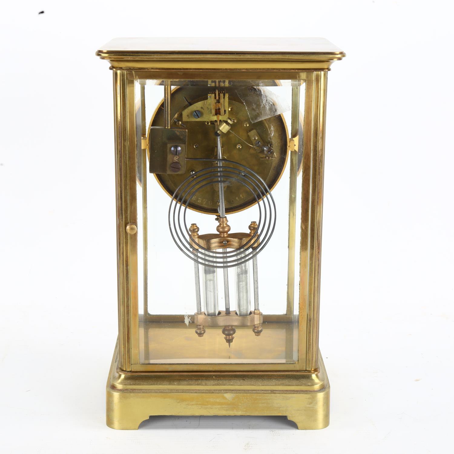 An early 20th century brass 4-glass 8-day mantel clock, hand painted white enamel dial with Arabic - Image 5 of 10