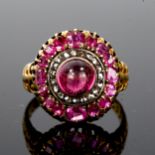 An Antique ruby and diamond cluster ring, unmarked gold settings, set with central high cabochon