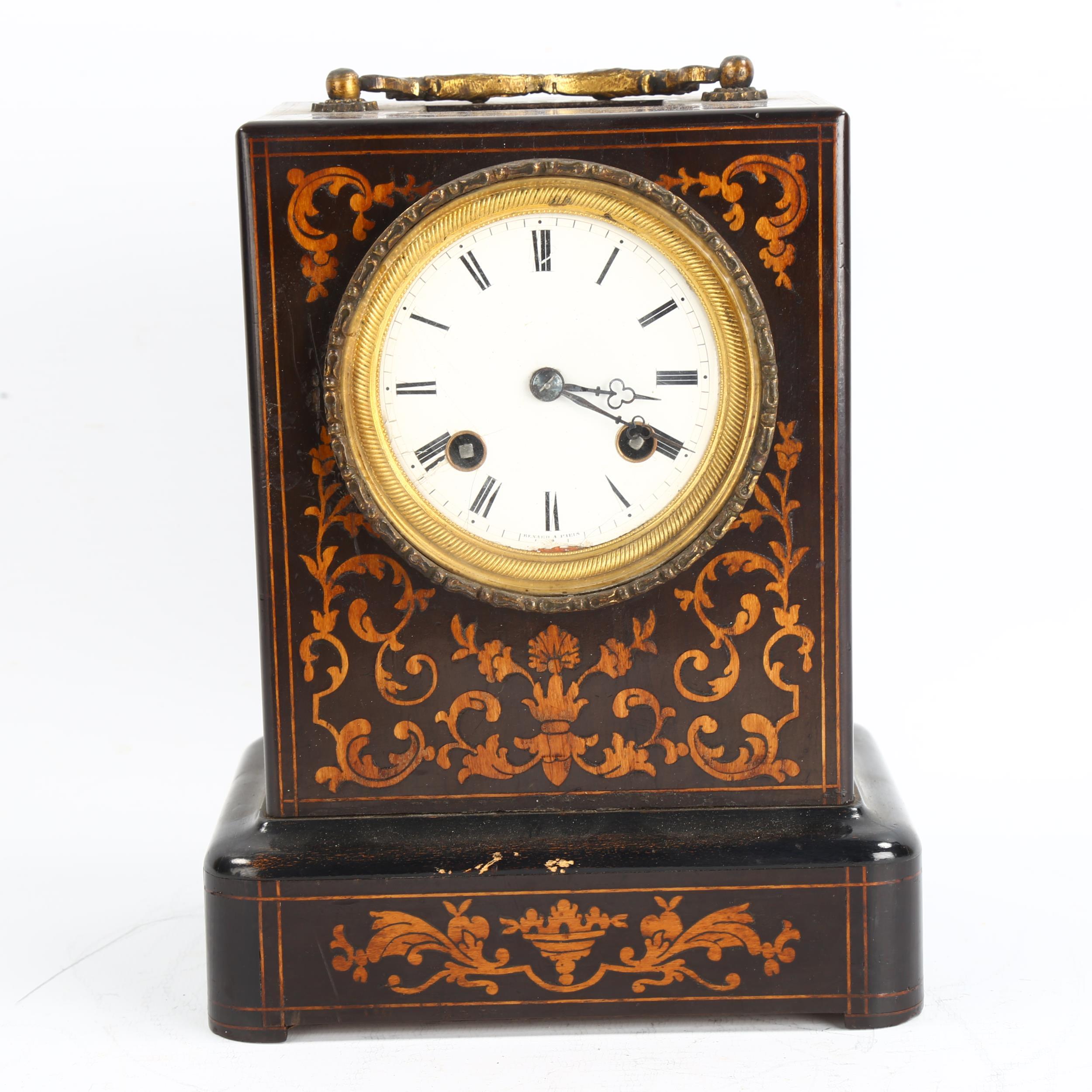 An early 20th century French ebonised and inlaid 8-day mantel clock, white enamel dial with Roman