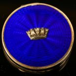 A George V Art Deco silver and blue enamel Cinque Ports compact, circular form with engine turned