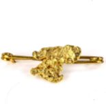 A gold nugget bar brooch, brooch length 37.4mm, 3.8g No damage or repairs, settings lightly abraded,