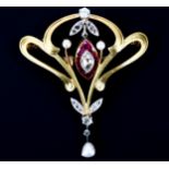 A French Art Nouveau gold ruby pearl and diamond openwork brooch, centrally suspending a marquise