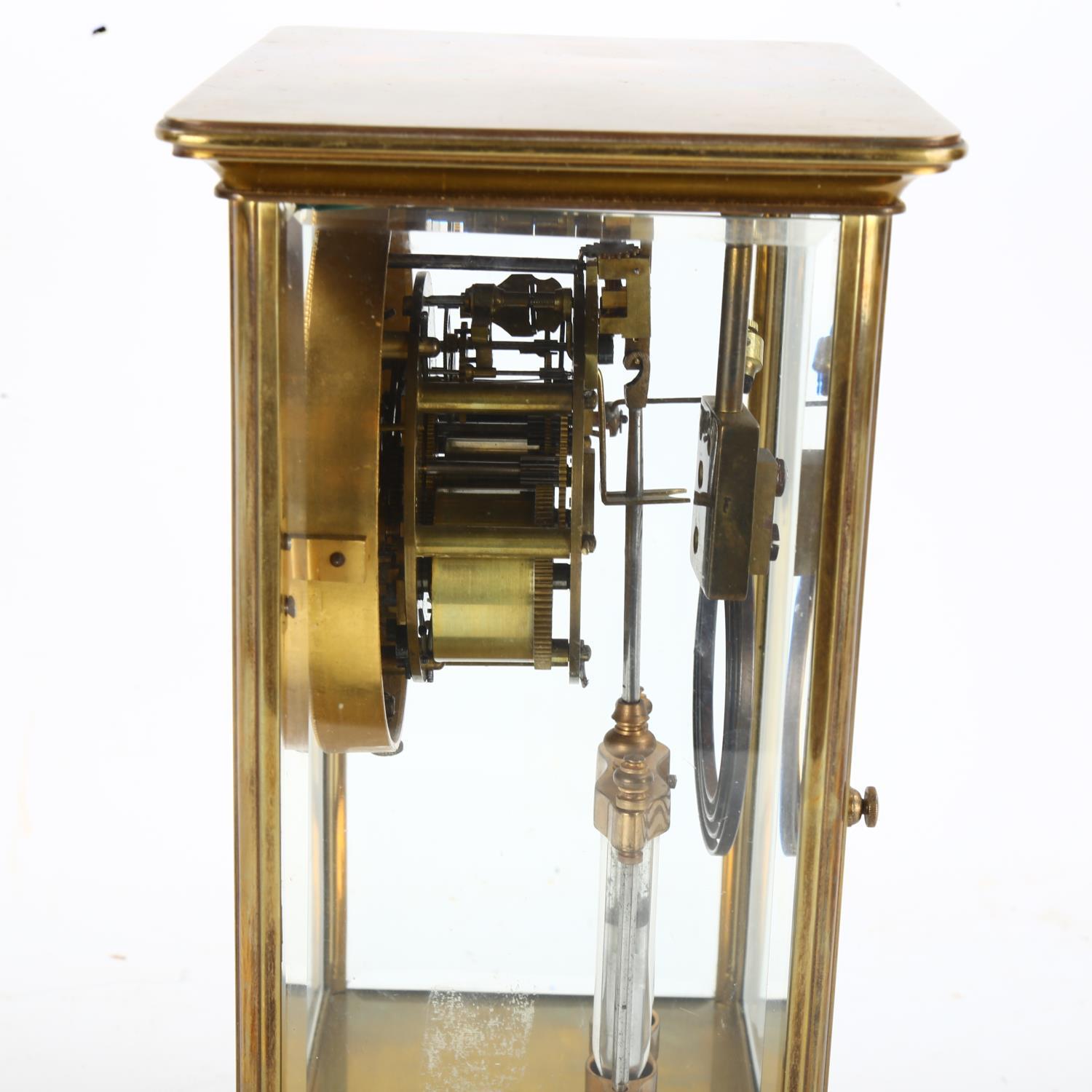An early 20th century brass 4-glass 8-day mantel clock, hand painted white enamel dial with Arabic - Image 10 of 10
