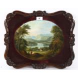 19th century oval oil on board, extensive landscape, unsigned, in carved and scrolled rosewood