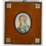 18th/19th century French School, miniature watercolour portrait on ivory of a young woman, signed