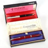 A group of fountain pens and ballpoint pens, including a Parker 45 convertible, a 1974 Parker, and