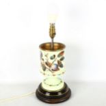 A Victorian opalescent glass lamp base, with hand painted fruit decoration, on black glass and