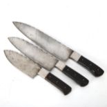 A graduated set of 3 Japanese hand forged knives with horn grips, largest length 35cm All in very