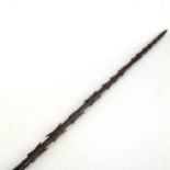 A Samoan hardwood spear, carved with rows of barbs, first half 19th century, length 210cm Some of