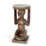 African Tribal carved wood stool in the form of a crouching figure, height 34cm