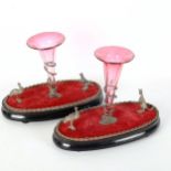 A pair of 19th century Australian epergnes, with cranberry glass trumpets and small silver plated