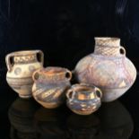 4 early Greek terracotta pots with painted decoration, largest height 22cm