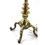 A good quality Victorian brass standard lamp, on heavy quadruple base, converted to electric All
