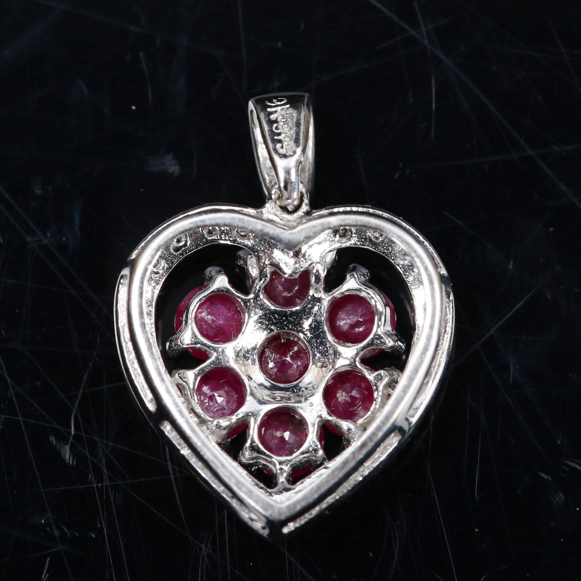 A modern 9ct white gold ruby and diamond cluster heart pendant, pendant height 23.1mm, 2.5g No - Image 3 of 4