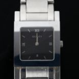 GUCCI - a stainless steel 7900M.1 quartz bracelet watch, sunburst black dial with quarterly Roman