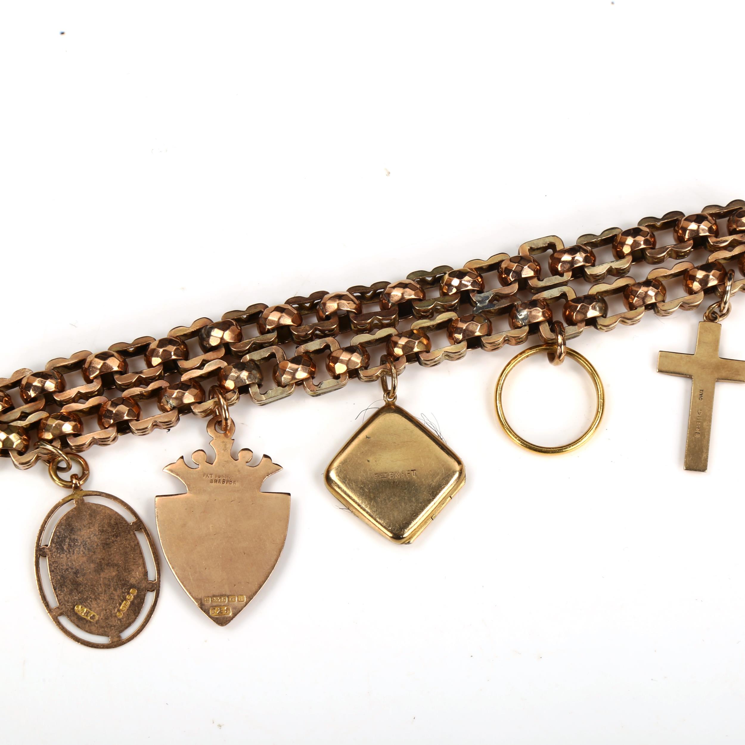 An unmarked gold double fancy link chain charm bracelet, tests as 9ct, with various charms, - Image 4 of 5