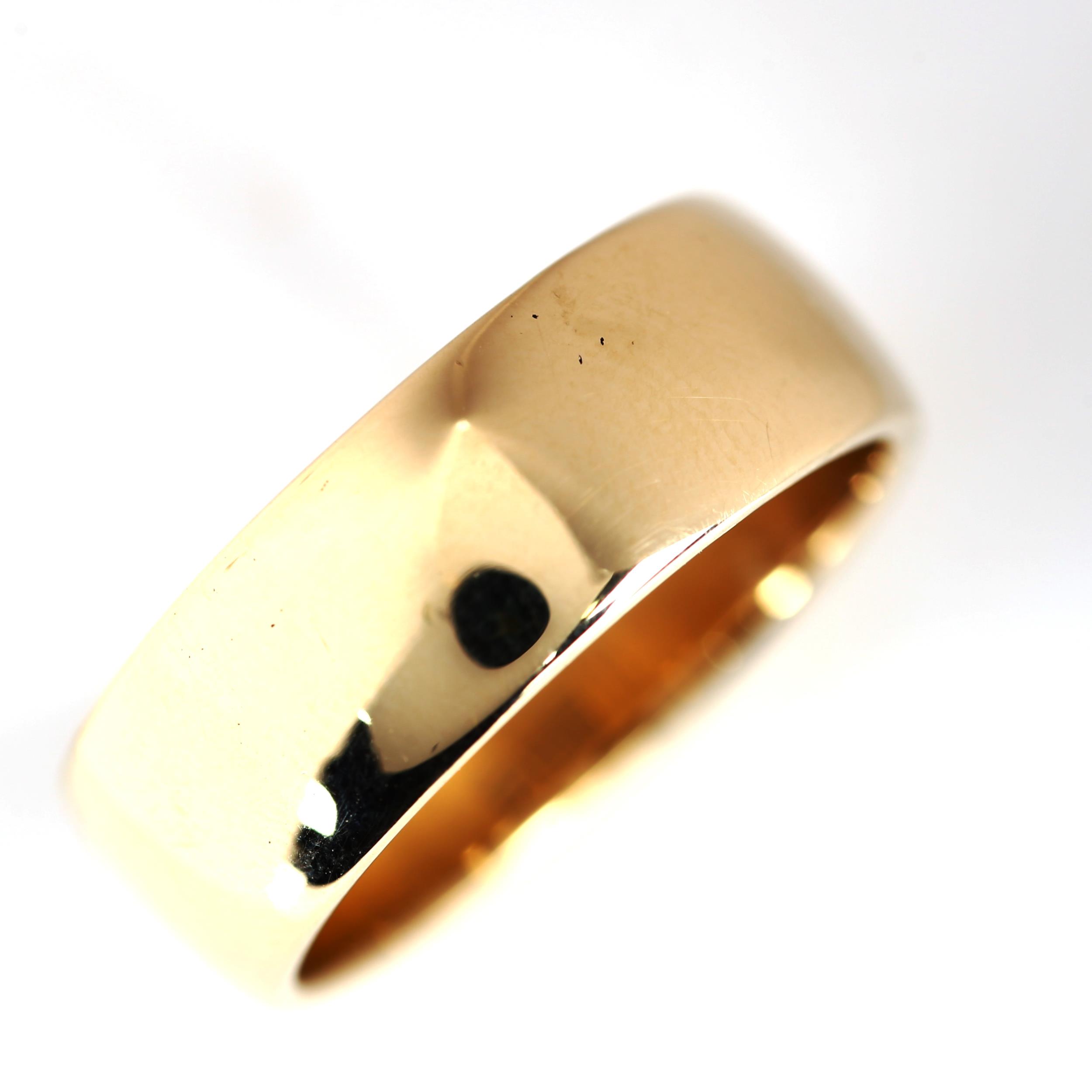 A late 20th century 9ct gold wedding band ring, maker's marks EJ Ltd, hallmarks Birmingham 1972,