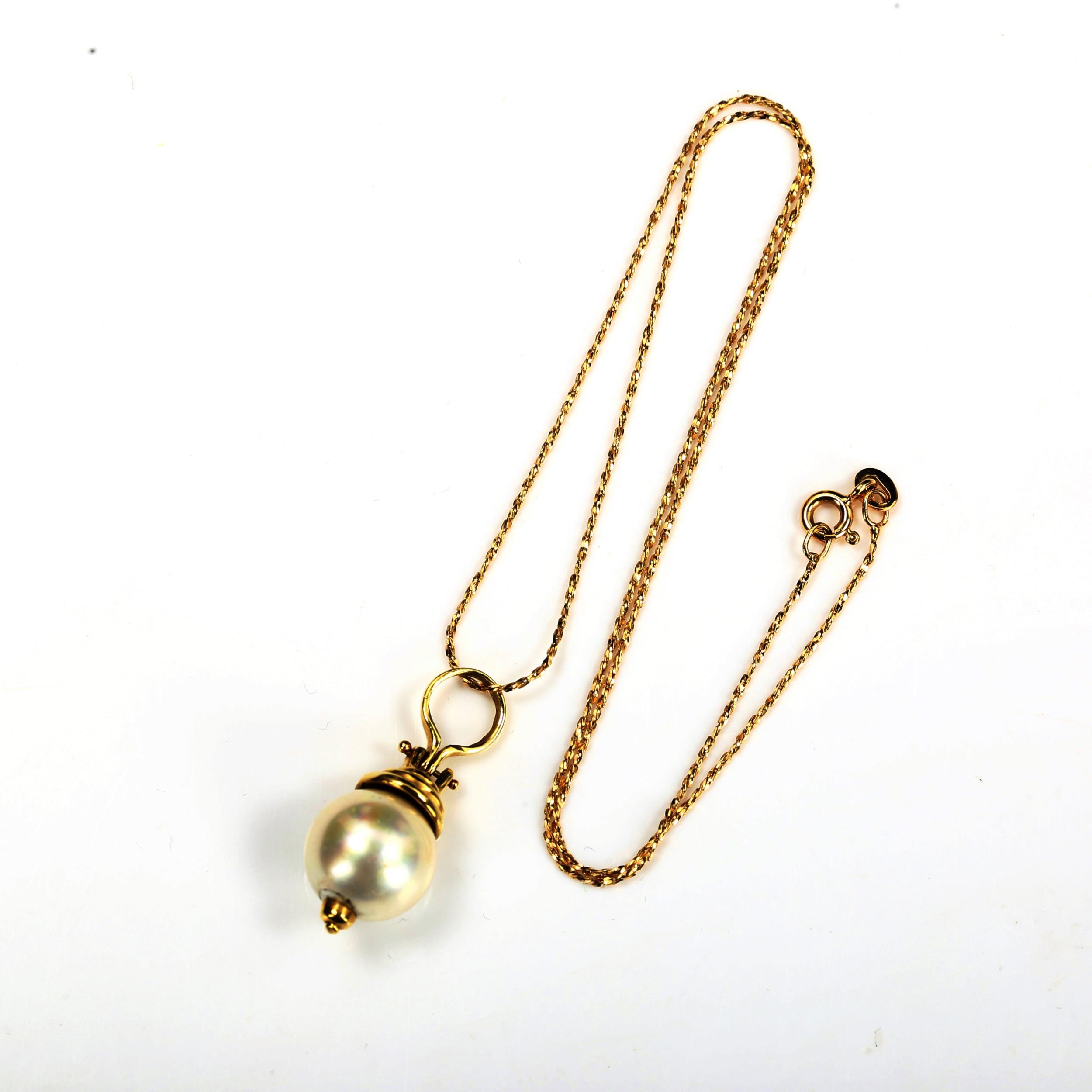 A modern cultured pearl pendant necklace, with unmarked 14ct gold mount and 18ct chain, pendant - Image 2 of 4