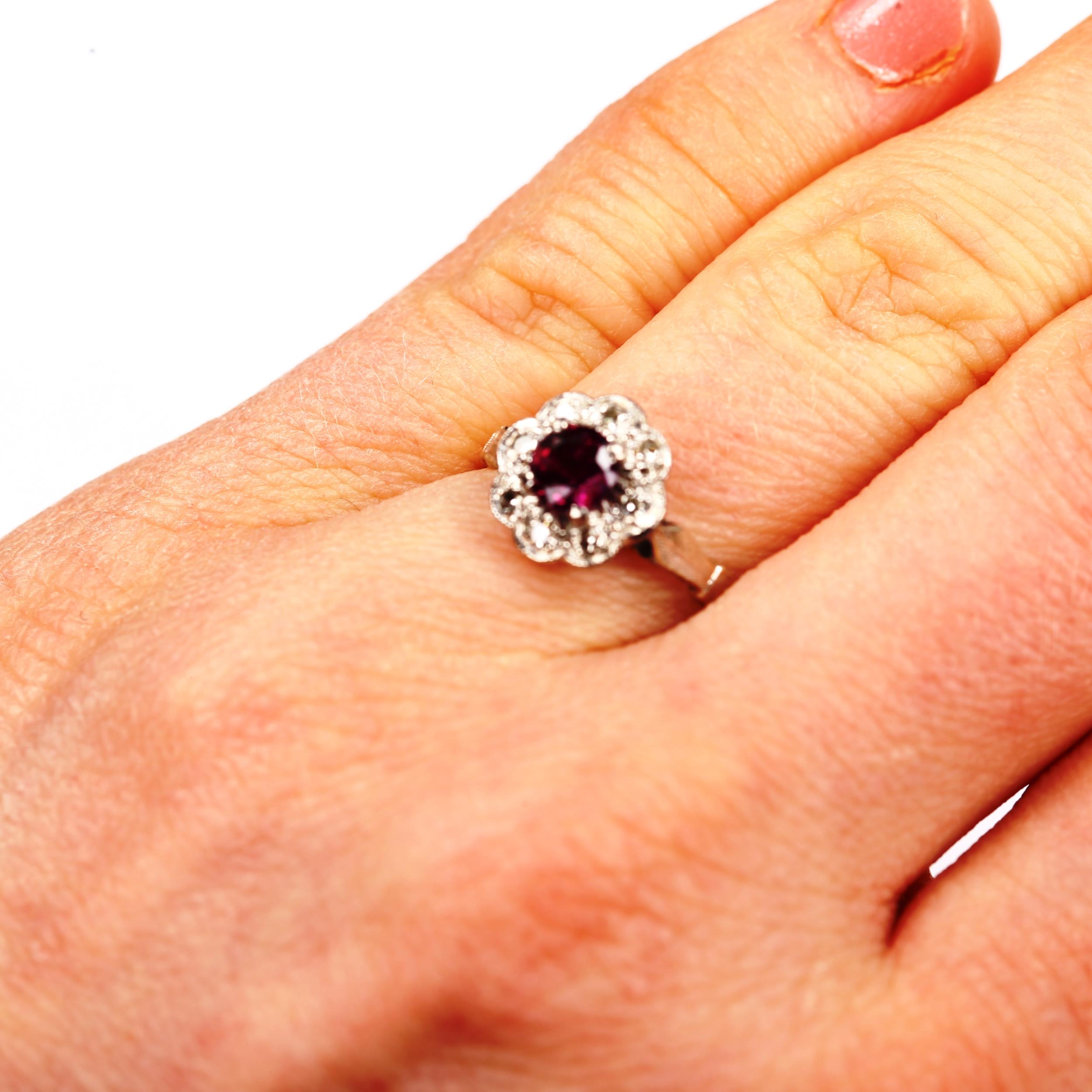 An 18ct gold ruby and diamond cluster ring, set with round-cut ruby and single-cut diamonds, setting - Image 4 of 4