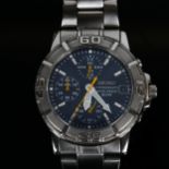 SEIKO - a stainless steel quartz chronograph bracelet watch, ref. V657-8060, blue dial with baton