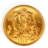 An Elizabeth II 1958 gold full sovereign coin, 7.9g
