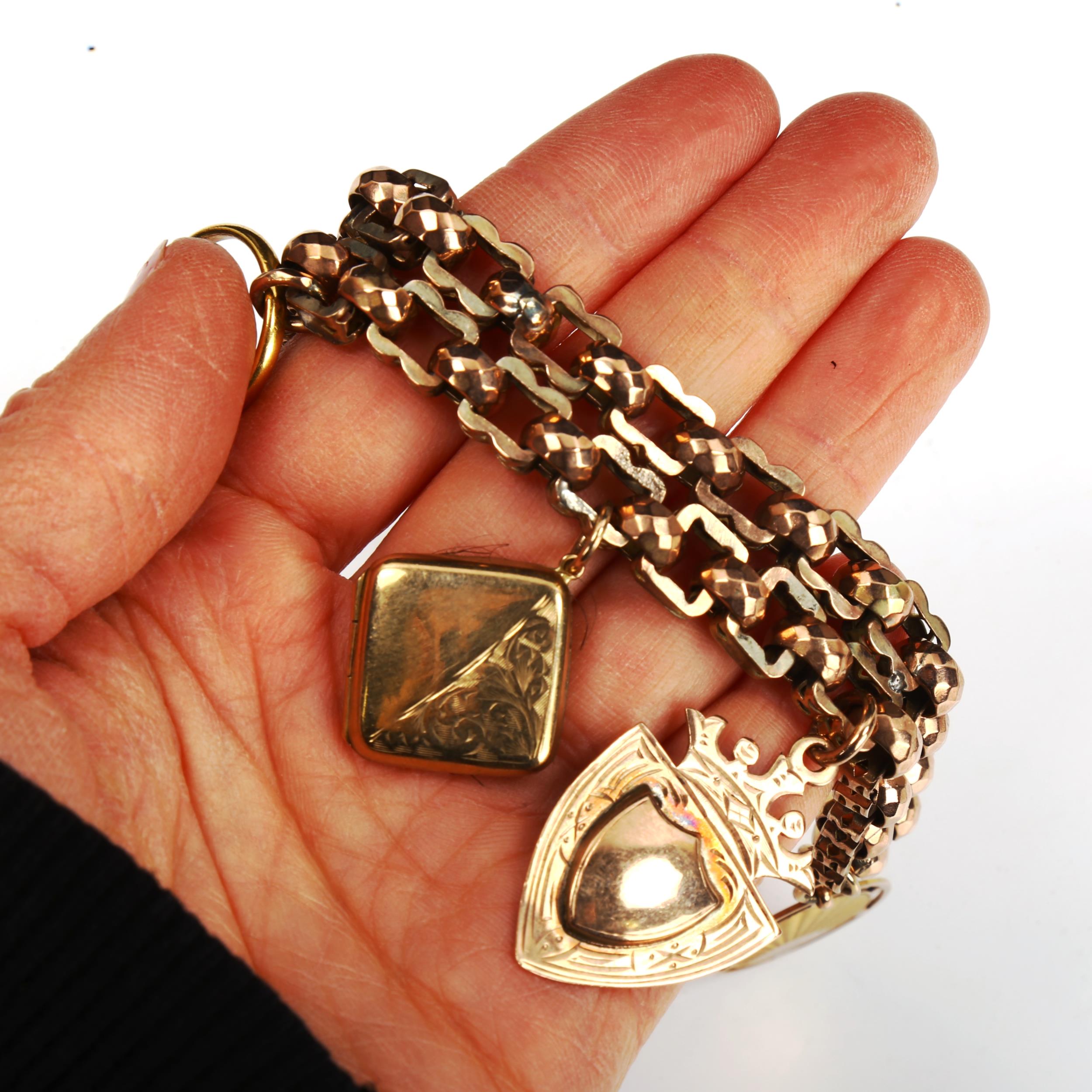 An unmarked gold double fancy link chain charm bracelet, tests as 9ct, with various charms, - Image 5 of 5