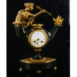 A Vienna Neo-Classical patinated bronze and ormolu Aladdin's lamp 8-day mantel clock, white enamel