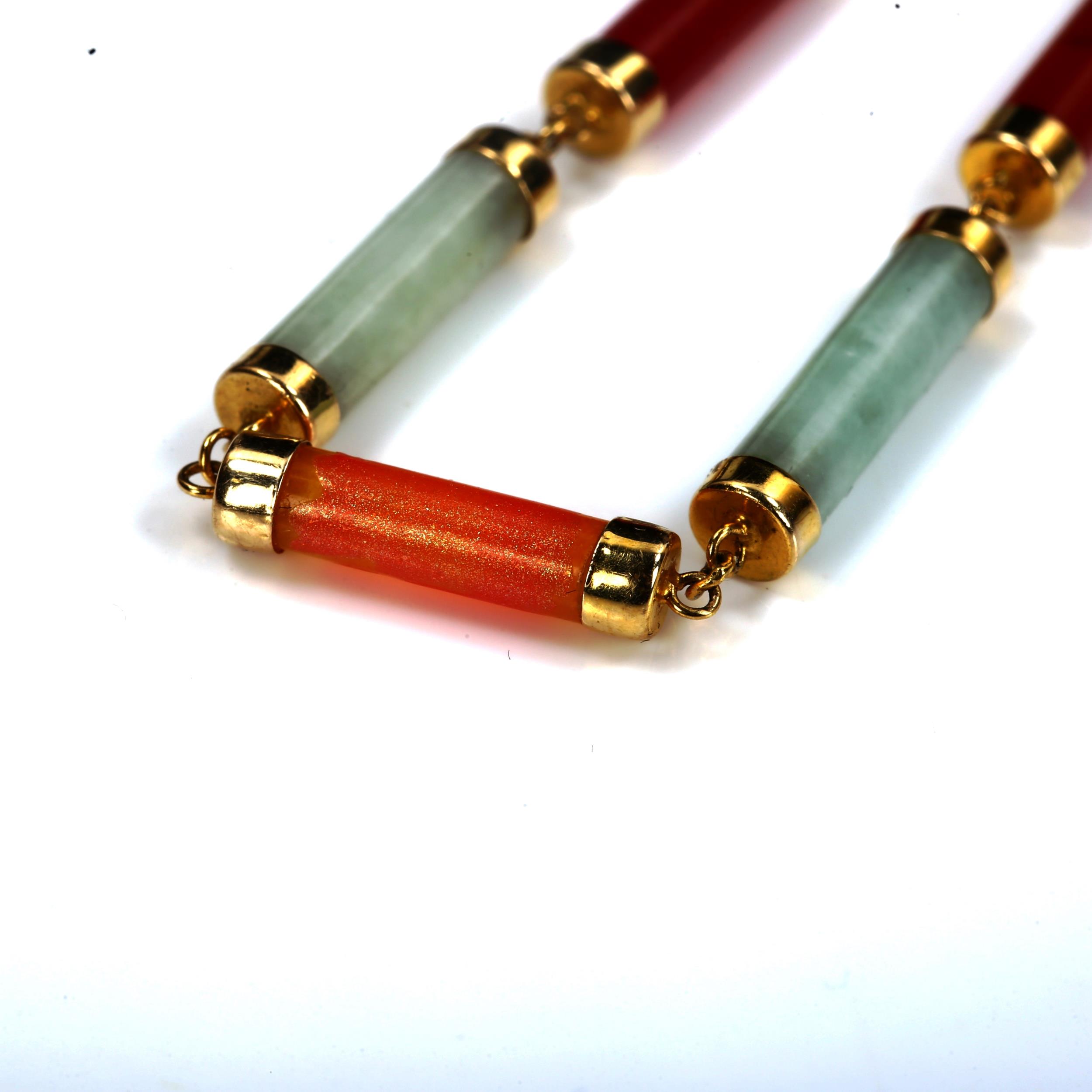 A modern Chinese 9ct gold jade panel bracelet, length 19cm, 6.5g No damage or repairs, no broken - Image 3 of 4