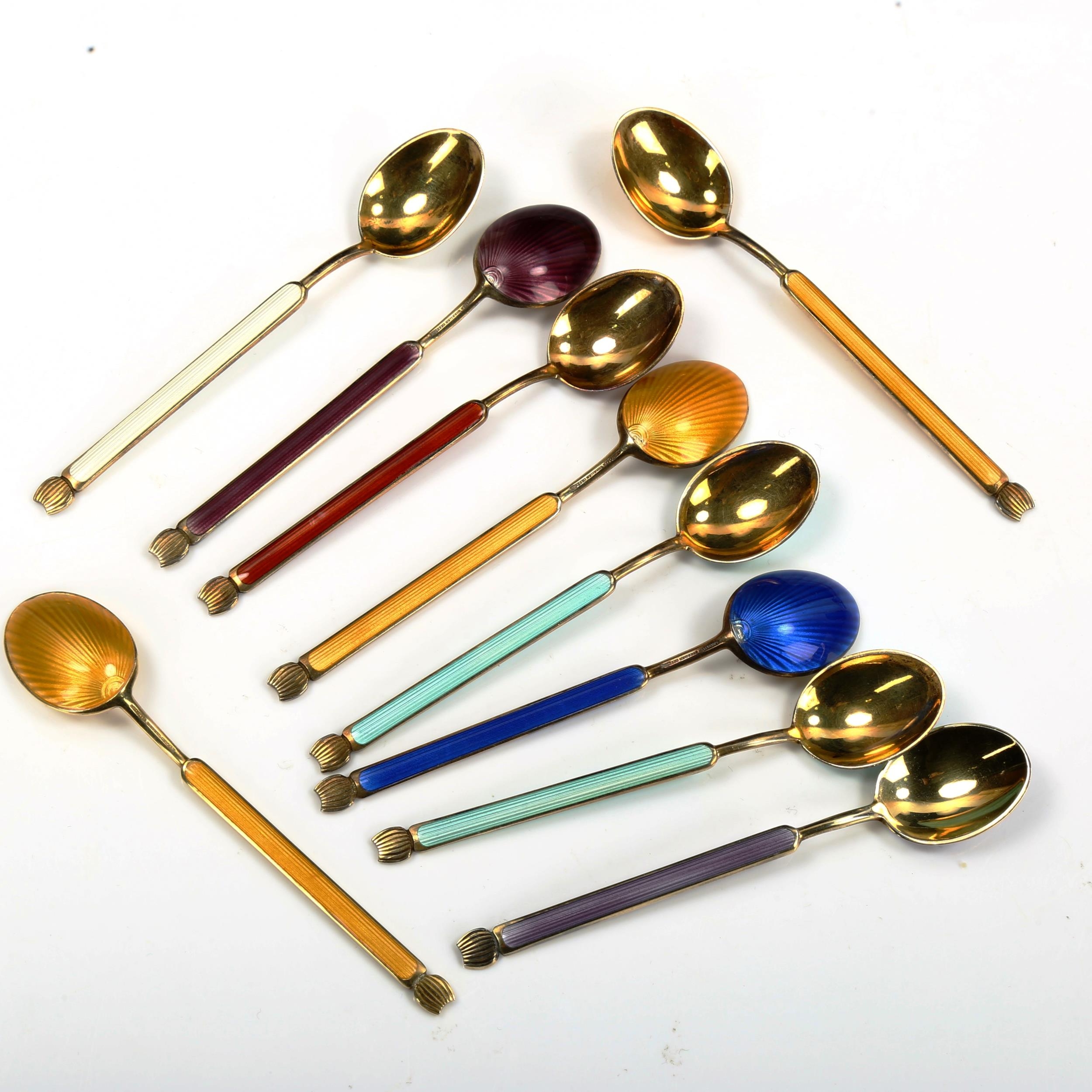 ANTON MICHELSEN - a set of 10 Danish vermeil sterling silver and harlequin enamel coffee spoons,